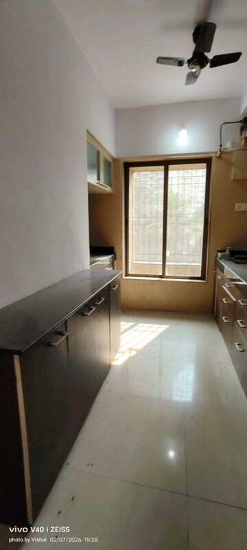 Kitchen in 2 BHK Apartment at Harmony Residency Owale, Owale – for Rent