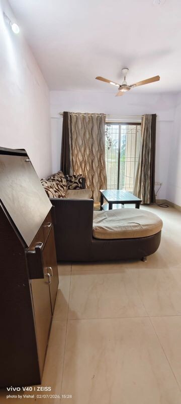 Living Room in 2 BHK Apartment at Harmony Residency Owale, Owale – for Rent