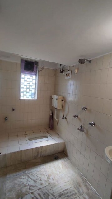 Bathroom in 2 BHK Apartment at Haridwar CHS Malad, Malad West – for Rent