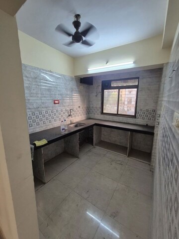 Kitchen in 2 BHK Apartment at Aangan CHS Kharghar, Kharghar Sector 19 – for Rent