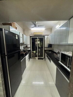Kitchen in 3 BHK Apartment at Regency Heights, Ghodbunder Road – for Sale