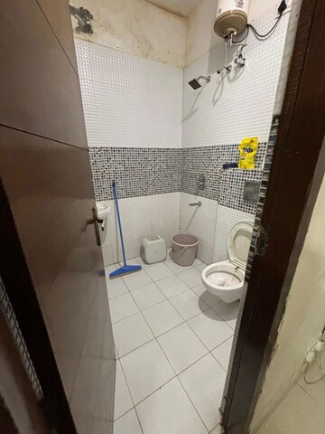 Bathroom in 3 BHK Builder Floor at MP Metro Towers, Dhakoli – for Rent