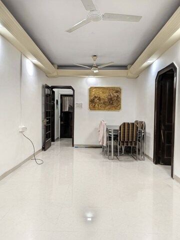 Living Room in 2 BHK Apartment at Manali Building, Malad West – for Rent