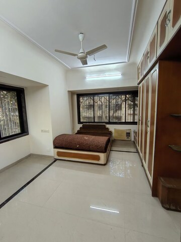 Living Room in 2 BHK Apartment at Manali Building, Malad West – for Rent