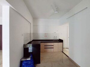 Kitchen in 2 BHK Apartment at Jhamtani Ace Abode, Kiwale – for Rent