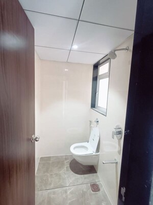 Bathroom in 2 BHK Apartment at Jhamtani Ace Abode, Kiwale – for Rent