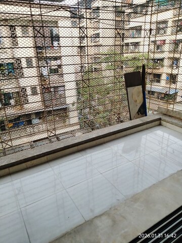 Balcony in 1 BHK Apartment at Kumkum Corner, Airoli Sector 19 – for Rent