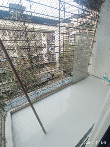 Balcony in 1 BHK Apartment at Kumkum Corner, Airoli Sector 19 – for Rent