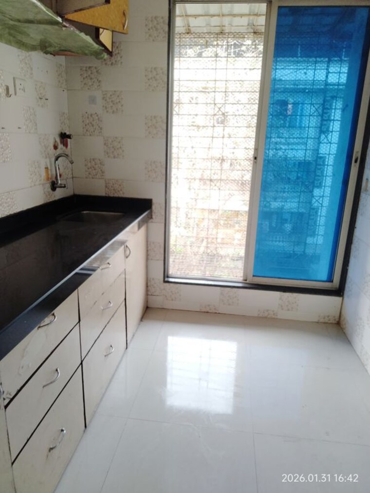 Kitchen, kumkum-corner 1 Bedroom 600 Sq.Ft. Apartment In Airoli Sector 19 Navi Mumbai 9921244