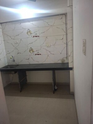 Kitchen in 2 BHK Apartment at Space Sai Ashish, Ulwe – for Rent