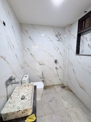 Bathroom in 3 BHK Builder Floor at Khirki Extension – for Sale