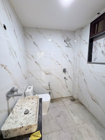 Bathroom in 3 BHK Builder Floor at Khirki Extension – for Sale