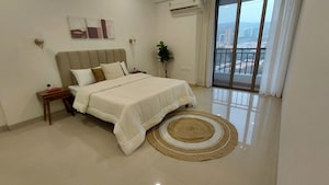 Master Bedroom in 3 BHK Apartment at Satellite Tower, Goregaon East – for Sale