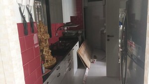 Kitchen in 1 BHK Apartment at Aavishkar Apartment, Grant Road West – for Rent