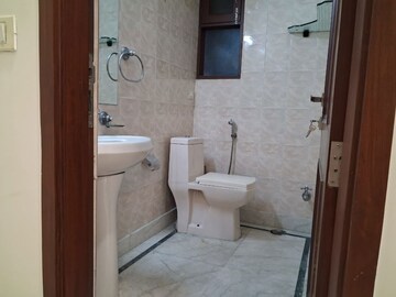 Bathroom in 2 BHK Builder Floor at Kalkaji – for Rent
