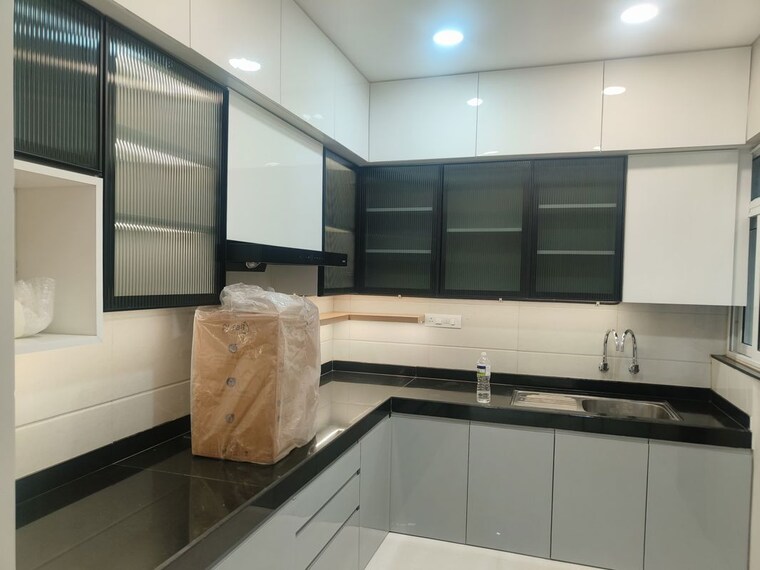 Kitchen, bhandari-7-plumeria-drive 2 Bedroom 877 Sq.Ft. Apartment In Tathawade Pune 9921296