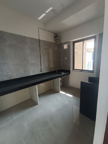 Kitchen in 2 BHK Apartment at Sheth Auris Bliss, Malad West – for Rent