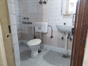 Bathroom in 3 BHK Apartment at Sarita Vihar – for Rent