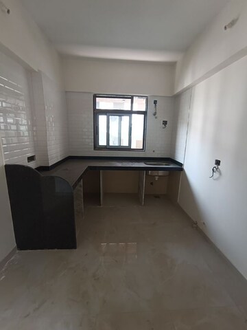 Kitchen in 1 BHK Apartment at Gowda Palash, Malad West – for Sale