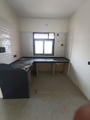 Kitchen in 1 BHK Apartment at Gowda Palash, Malad West – for Sale
