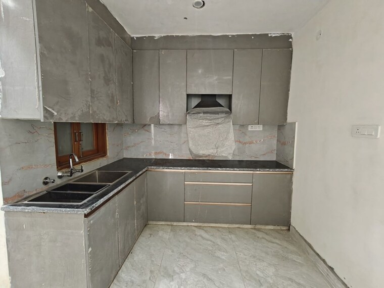 Kitchen, rajpur khurd extension 3 Bedroom 120 Sq.Yd. Builder Floor In Rajpur Khurd Extension Delhi 9921432