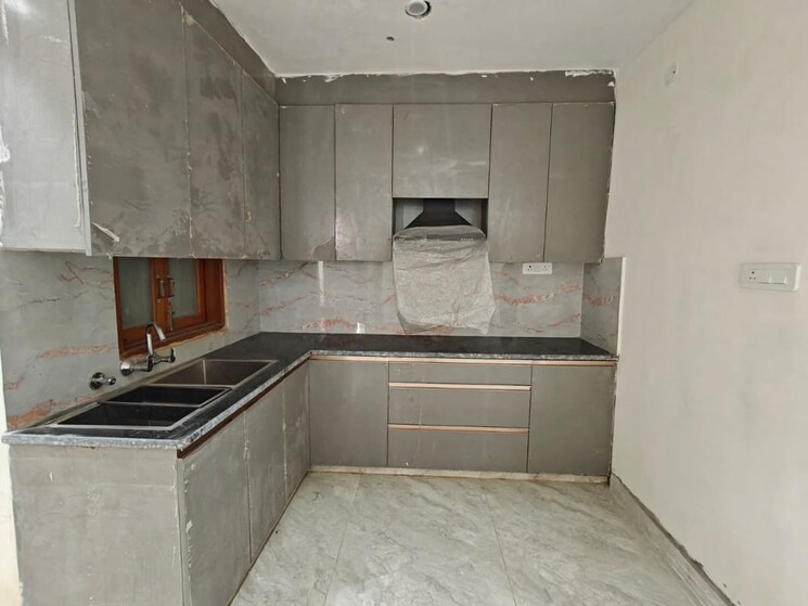 Kitchen, rajpur khurd extension 3 Bedroom 120 Sq.Yd. Builder Floor In Rajpur Khurd Extension Delhi 9921432