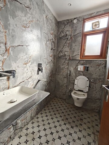 Bathroom in 3 BHK Builder Floor at Rajpur Khurd Extension – for Sale