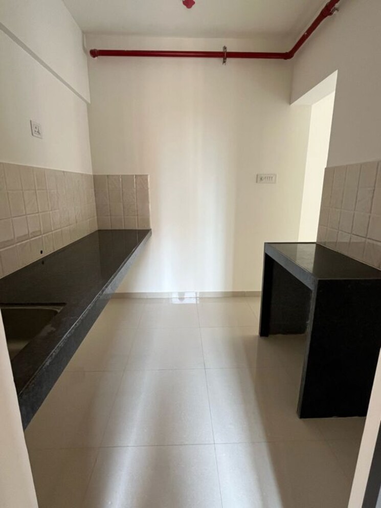 Kitchen, shapoorji-pallonji-joyville-hadapsar-annexe 2 Bedroom 726 Sq.Ft. Apartment In Hadapsar Pune 9921449