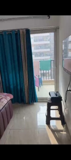 Living Room in 2 BHK Apartment at Gaur Atulyam, Omicron I Greater Noida – for Rent