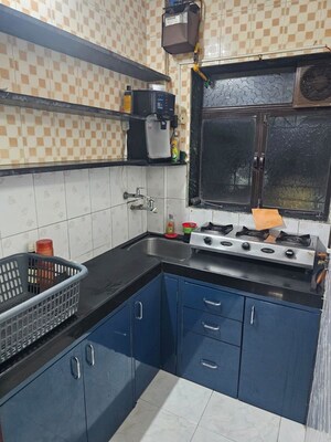 Kitchen in 1 BHK Apartment at Runwal Gardens, Dombivli East – for Rent
