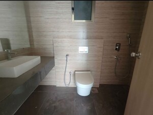 Bathroom in 3 BHK Apartment at Rajesh Raj Infinia, Malad West – for Rent