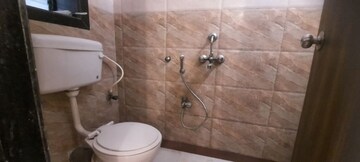 Bathroom in 2 BHK Apartment at Oshiwara Mhada, Andheri West – for Rent