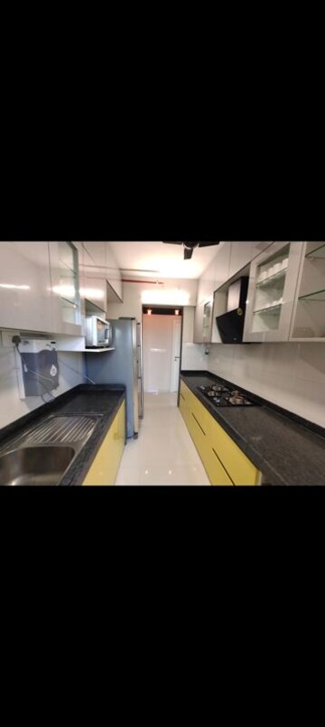 Kitchen in 2 BHK Apartment at Rustomjee Urbania Aurelia, Thane West – for Rent