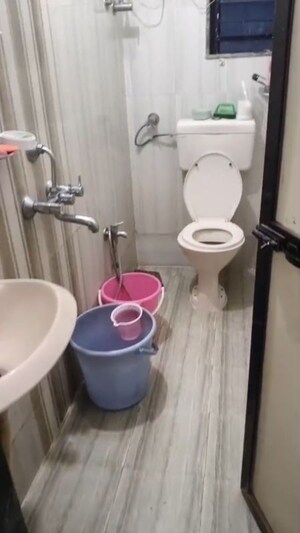 Bathroom in 2 BHK Apartment at Shraddha Infinity, Bhandup West – for Rent