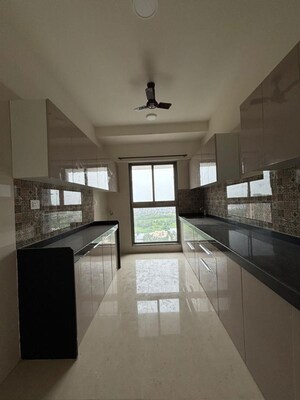 Kitchen in 2 BHK Apartment at Rajesh Raj Infinia, Malad West – for Rent
