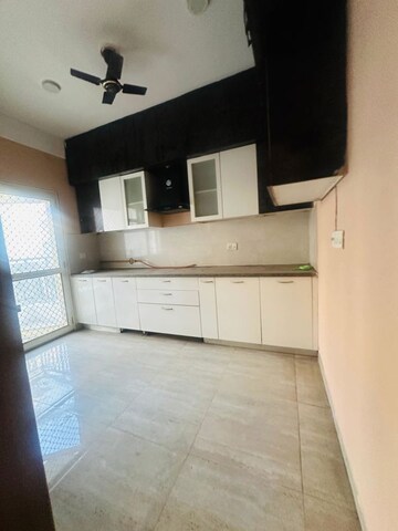 Kitchen in 3.5 BHK Builder Floor at Puri Aman Vilas, Sector 89 – for Rent