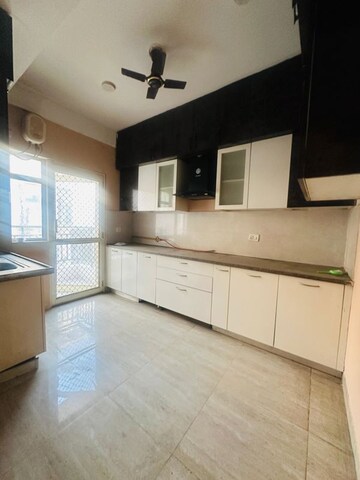 Kitchen in 3.5 BHK Builder Floor at Puri Aman Vilas, Sector 89 – for Rent