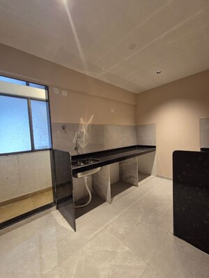 Kitchen in 2 BHK Apartment at Shiv Shakti Tower 28, Malad East – for Sale