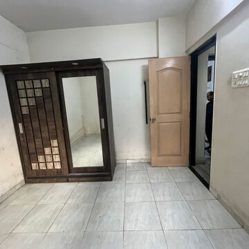 Room in 2 BHK Apartment at Vrindavan Society Borivali West, Poisar – for Rent