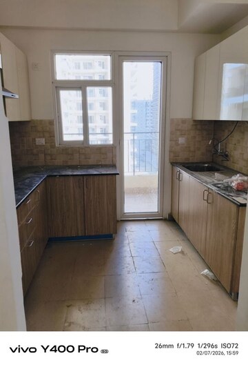 Kitchen in 4 BHK Apartment at Amrapali Crystal Homes, Sector 76 – for Rent