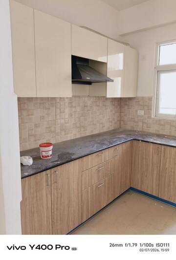 Kitchen in 4 BHK Apartment at Amrapali Crystal Homes, Sector 76 – for Rent