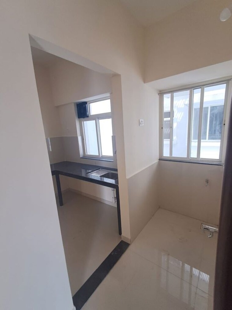 Laundry Area, megapolis-serenity 2 Bedroom 850 Sq.Ft. Apartment In Hinjewadi Pune 9922076