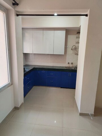 Kitchen in 2 BHK Apartment at Shree Vardhman Green Court, Sector 90 – for Rent