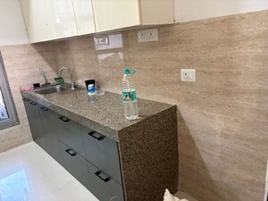 Kitchen in 3 BHK Apartment at Sunteck City Avenue 4, Goregaon West – for Rent