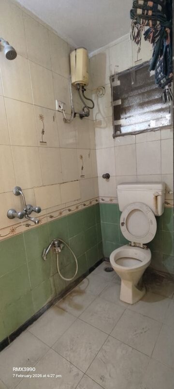 Bathroom in 2 BHK Apartment at Trimurti Narayan, Mulund East – for Rent