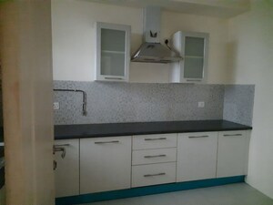 Kitchen in 3 BHK Apartment at Jaypee Greens Kalypso Court, Sector 128 – for Sale