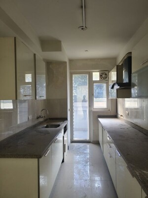 Kitchen in 3.5 BHK Apartment at Emaar Imperial Gardens, Sector 102 – for Sale