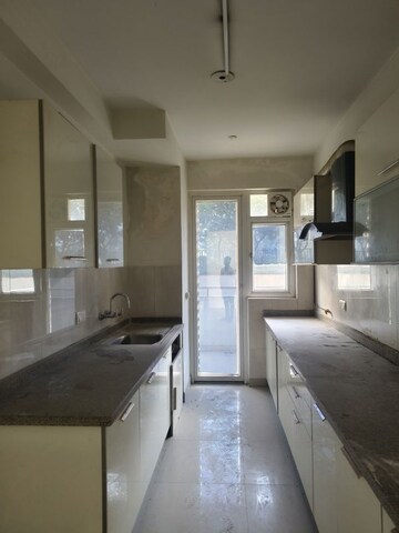 Kitchen in 3.5 BHK Apartment at Emaar Imperial Gardens, Sector 102 – for Sale