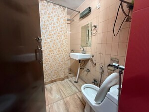 Bathroom in 3 BHK Apartment at Vasant Kunj – for Rent