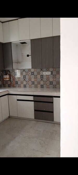 Kitchen in 3 BHK Apartment at Uninav Bliss, Raj Nagar Extension – for Sale